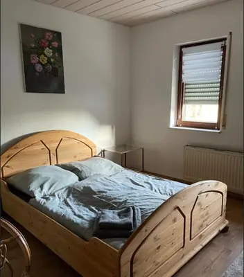 Ein Bett oder Betten in einem Zimmer der Unterkunft Ferienhaus