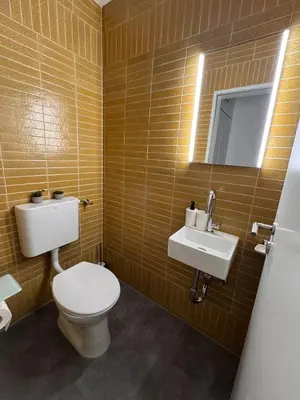 Ein Badezimmer in der Unterkunft TRIMOSA - Apartments & Homes