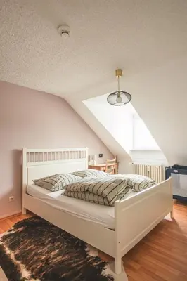 Ein Bett oder Betten in einem Zimmer der Unterkunft Sam & Karo Boutique Apartment