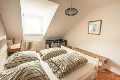 Ein Bett oder Betten in einem Zimmer der Unterkunft Sam & Karo Boutique Apartment