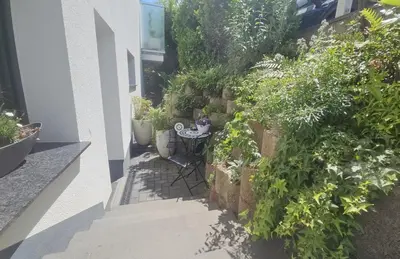 Ein Garten an der Unterkunft Ferienwohnung Ahrfair im Kräutergarten