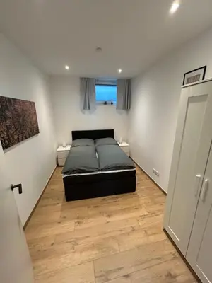Ein Bett oder Betten in einem Zimmer der Unterkunft Ferienwohnung Schöne Aussicht