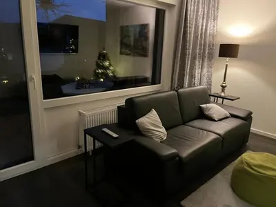 Ein Sitzbereich in der Unterkunft Luxuriöse Ferienwohnung EG