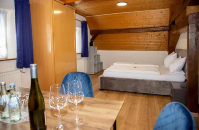 Ein Bett oder Betten in einem Zimmer der Unterkunft Weinhaus Kurtrierer Hof