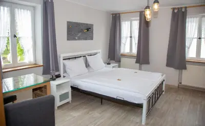 Ein Bett oder Betten in einem Zimmer der Unterkunft Weinhaus Kurtrierer Hof