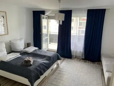 Ein Bett oder Betten in einem Zimmer der Unterkunft Schöne Wohnung in ruhiger Lage