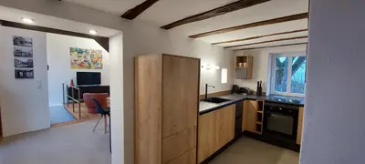 Küche/Küchenzeile in der Unterkunft Scheune als besonderes Ferienhaus in der Südeifel - SCHEIA
