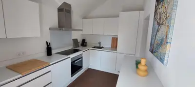 Küche/Küchenzeile in der Unterkunft Ferienhaus mit Baukulturpreis in der Südeifel - Ferienhaus TRÄNK