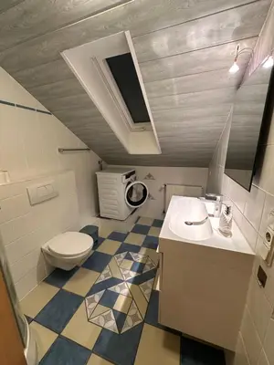 Ein Badezimmer in der Unterkunft Ferienwohnung LESOM