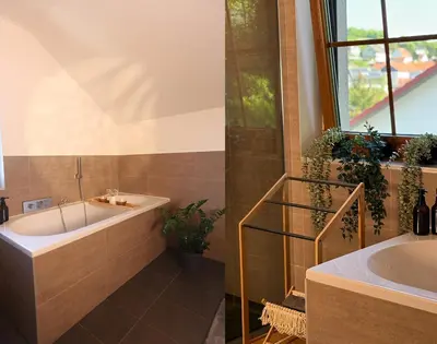 Ein Badezimmer in der Unterkunft Luxus-Familienvilla mit privatem Pool und XXL Whirlpool, Kamin, Grill & Blick in die Weinberge