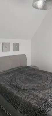 Ein Bett oder Betten in einem Zimmer der Unterkunft Koblenz Asterstein Ferienwohnung