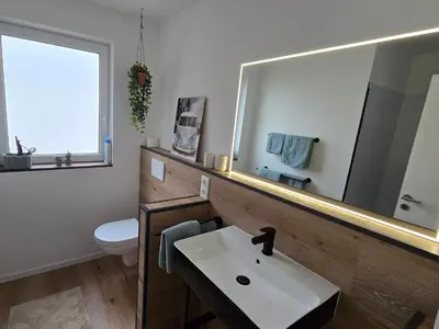 Ein Badezimmer in der Unterkunft RINGZEIT-Lodge