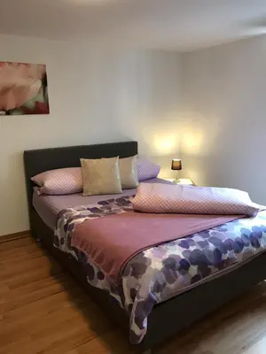 Ein Bett oder Betten in einem Zimmer der Unterkunft Ferienwohnung 3 Löhr Koblenz