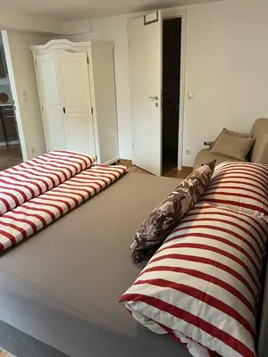 Ein Bett oder Betten in einem Zimmer der Unterkunft Ferienwohnung 3 Löhr Koblenz