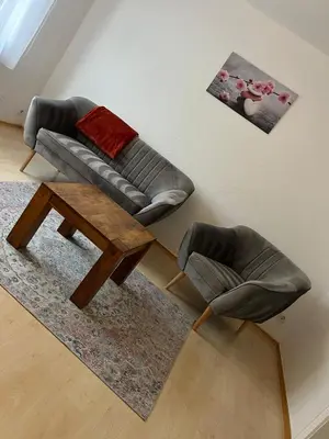 Ein Sitzbereich in der Unterkunft Ferienwohnung 5 in direkter Nähe zum Rhein