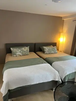 Ein Bett oder Betten in einem Zimmer der Unterkunft Ferienwohnung 5 in direkter Nähe zum Rhein