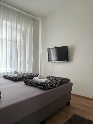 Ein Bett oder Betten in einem Zimmer der Unterkunft Lahnblick Deluxe