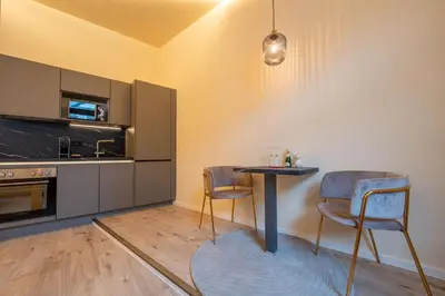 Küche/Küchenzeile in der Unterkunft LLR Design Apartment- Santal Blush im Zentrum von Koblenz