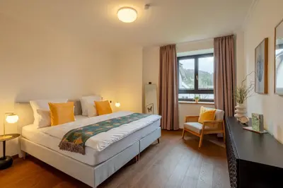 Ein Bett oder Betten in einem Zimmer der Unterkunft Tropical Wellness Suite I Sauna I Whirlpool I Hot Tub I TV I BBQ
