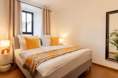 Ein Bett oder Betten in einem Zimmer der Unterkunft Tropical Wellness Suite I Sauna I Whirlpool I Hot Tub I TV I BBQ