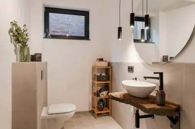Ein Badezimmer in der Unterkunft Bright Suite I Sauna I TV I Kitchen