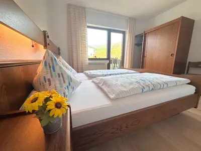 Ein Bett oder Betten in einem Zimmer der Unterkunft Ferienwohnungen 