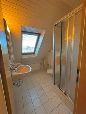 Ein Badezimmer in der Unterkunft Ferienwohnungen 