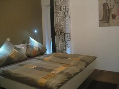 Ein Bett oder Betten in einem Zimmer der Unterkunft Fewo Mosel & mehr