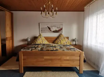 Ein Bett oder Betten in einem Zimmer der Unterkunft Ferienwohnung Rotha