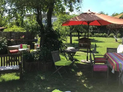 Ein Garten an der Unterkunft Ferienwohnungen Perlina Karpat