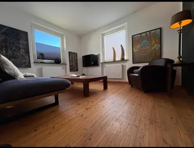 Ein Sitzbereich in der Unterkunft Ferienwohnung EG AusZeit