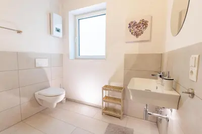 Ein Badezimmer in der Unterkunft Pitlane Apartment 3