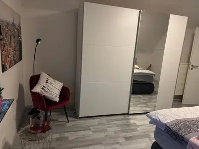 Ein Bett oder Betten in einem Zimmer der Unterkunft Erica Ferienwohnung auf dem Traumpfad