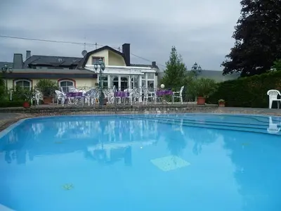 Der Swimmingpool an oder in der Nähe von Pension-Elfi
