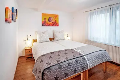 Ein Bett oder Betten in einem Zimmer der Unterkunft Ferienhaus Sternschnuppe