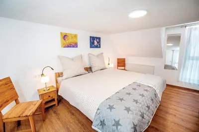 Ein Bett oder Betten in einem Zimmer der Unterkunft Ferienhaus Sternschnuppe
