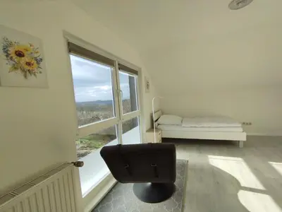 Ein Sitzbereich in der Unterkunft gemütliche Ferienwohnung in ruhiger Lage, Nähe Luxemburg und Trier - Holiday and Nature Olk