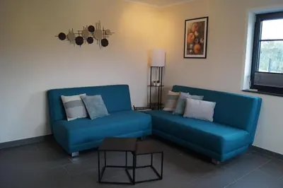 Ein Sitzbereich in der Unterkunft Ferienwohnung Hof Lamberty