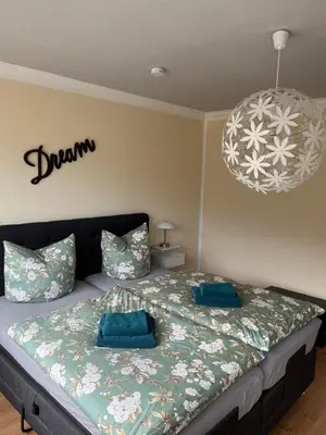 Ein Bett oder Betten in einem Zimmer der Unterkunft Burgnest