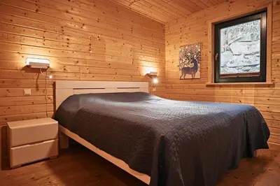 Ein Bett oder Betten in einem Zimmer der Unterkunft Ferienhaus Nina am Riedener Waldsee