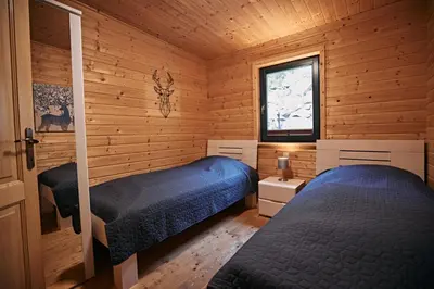 Ein Bett oder Betten in einem Zimmer der Unterkunft Ferienhaus Nina am Riedener Waldsee