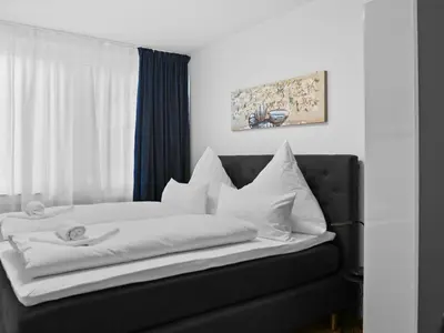 Ein Bett oder Betten in einem Zimmer der Unterkunft Living bei Höchst