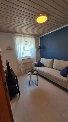 Ein Sitzbereich in der Unterkunft Ferienwohnung Altenberg