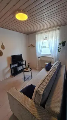 Ein Bett oder Betten in einem Zimmer der Unterkunft Ferienwohnung Altenberg