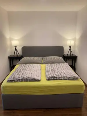 Ein Bett oder Betten in einem Zimmer der Unterkunft Wunderschön gelegene Ferienwohnungen im Zentrum von Zell an der Mosel