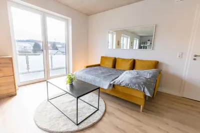 Ein Sitzbereich in der Unterkunft Pitlane Apartment 4