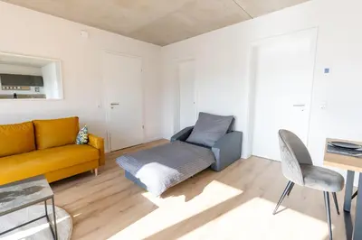 Ein Sitzbereich in der Unterkunft Pitlane Apartment 4
