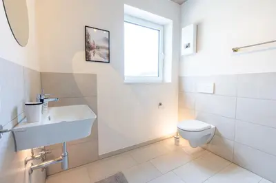 Ein Badezimmer in der Unterkunft Pitlane Apartment 4
