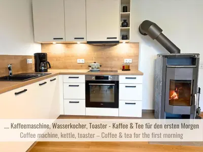 Küche/Küchenzeile in der Unterkunft Kamin-Apartment Bodanum mit eigener Terrasse - naturnahe Ortsrandlage - VDSL - 10 min zum Nürburgring