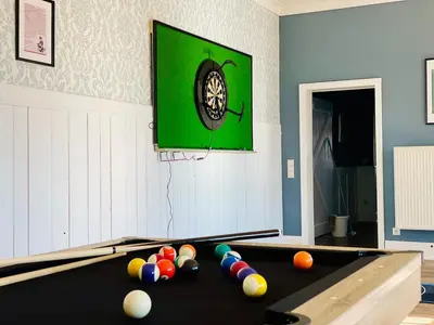 Ein Billardtisch in der Unterkunft Ferienhaus Old School